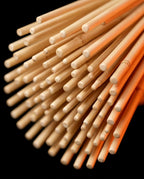 Macro of the smooth tapered bamboo rod tips of the massage roller