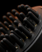 Macro of the soft silicone bristles on the scalp massage brush