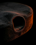 Macro of the U-shaped coccyx cutout at the rear of the seat cushion