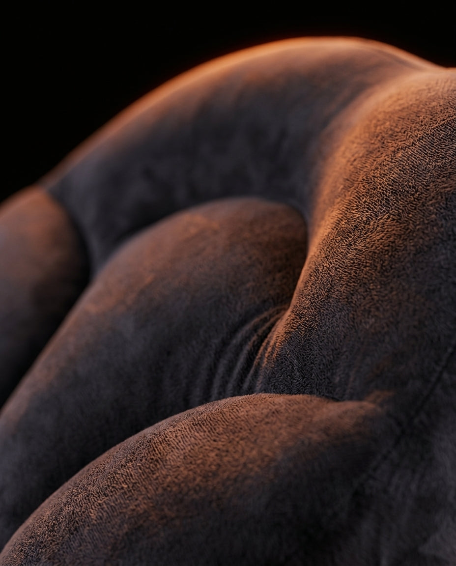 Macro close-up of soft velvet fabric texture on the neck support pillow