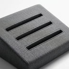 Macro of the three angled device grooves on the grey lap pillow