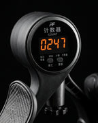 Macro of the hip trainer's LCD rep counter glowing orange at 0247