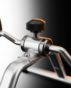 Macro of the adjustable resistance knob on the pedal exercise bike frame