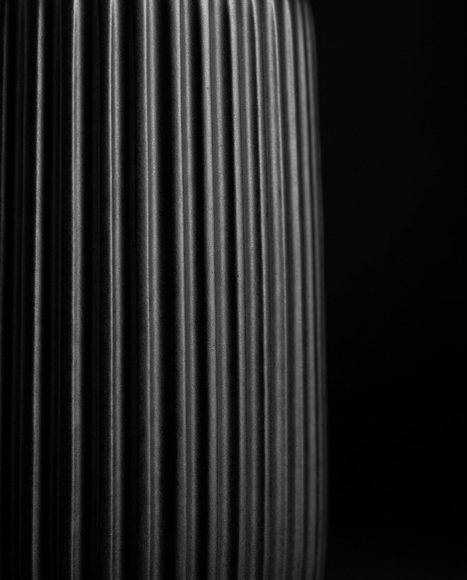 Macro of the vertical fluted ribbed texture on the ceramic holder