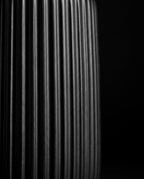 Macro of the vertical fluted ribbed texture on the ceramic holder