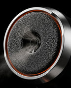 Macro of the foot file's textured coarse roller head and chrome ring