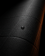 Macro of the textured non-slip surface of the black yoga mat