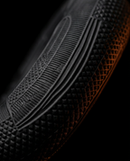 Macro of the knurled anti-slip texture on the black grip ring