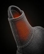 Macro of the heated finger wrap thumb sleeve glowing warm orange inside