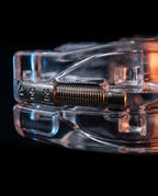 Close-up of the threaded screw jaw-advancement mechanism on the mouth guard