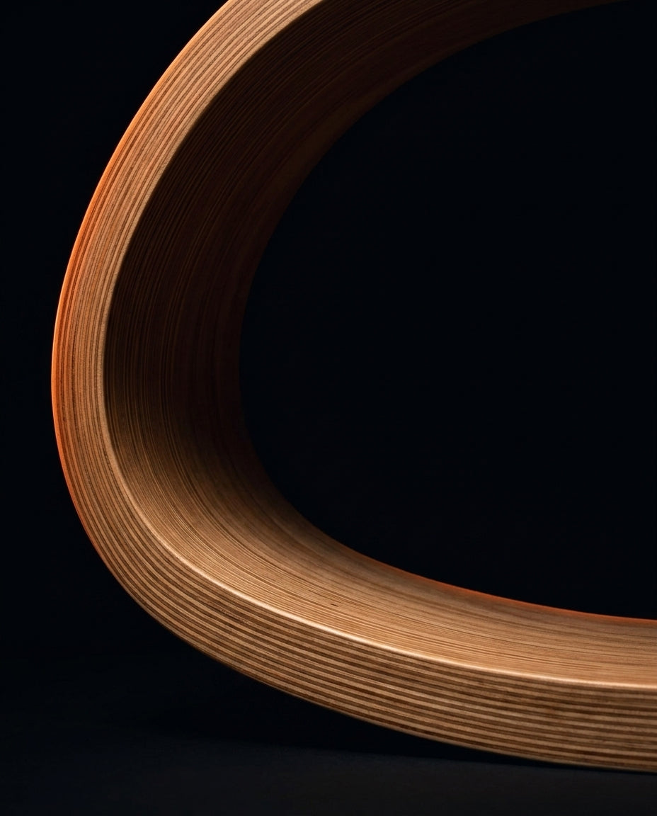 Macro of the curved bentwood rocker base and laminated wood layers