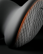 Close-up of the quilted breathable air-mesh side panel on the neck cushion