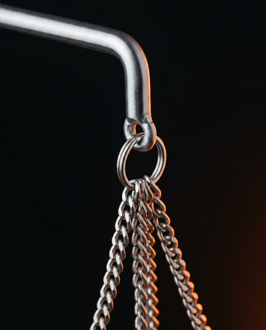 Close-up of stainless steel chain ring and arm on hanging oil bowl