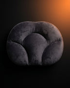 Top-down view of egg-shaped pillow showing contoured ergonomic head and neck cradle