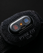 Close-up of the wrist strap control module with USB-C port and buttons