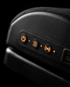 Close-up of the power, heat and vibration control buttons on the foot cushion