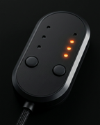 Close-up of the black control pod with glowing heat-level indicator lights