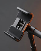 Macro of the spring-loaded padded cradle grips holding the device