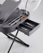 Pull-out drawer of the foot station holding nail grooming tools