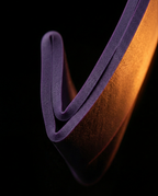 Close-up of the smooth double-folded reinforced edge of a purple band