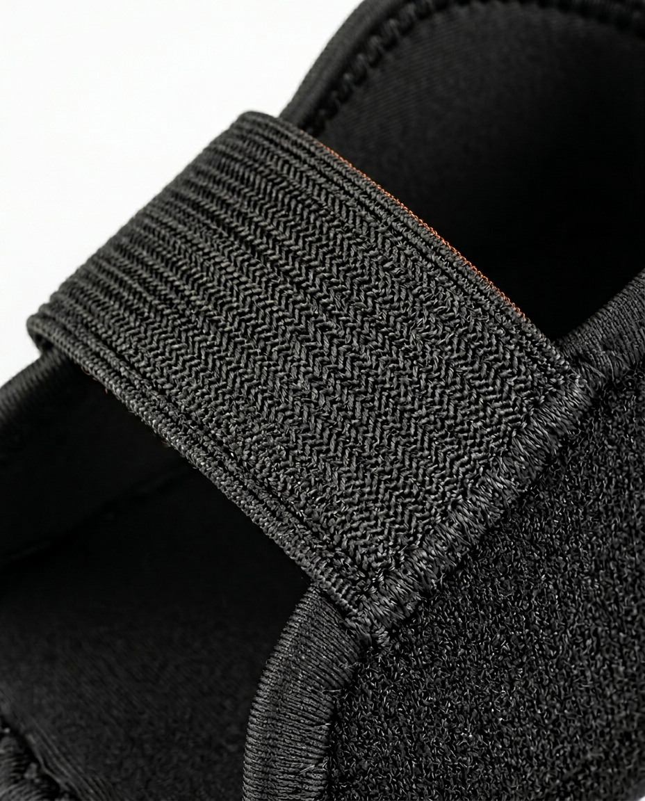 Macro of the adjustable woven elastic strap on the heel cushion
