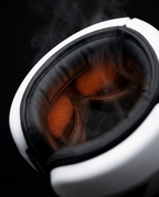 Close-up of the warm glowing heat pads and soft cushioning inside the eye massager