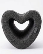 Close-up of the leg pillow's heart-shaped contour and inner channel
