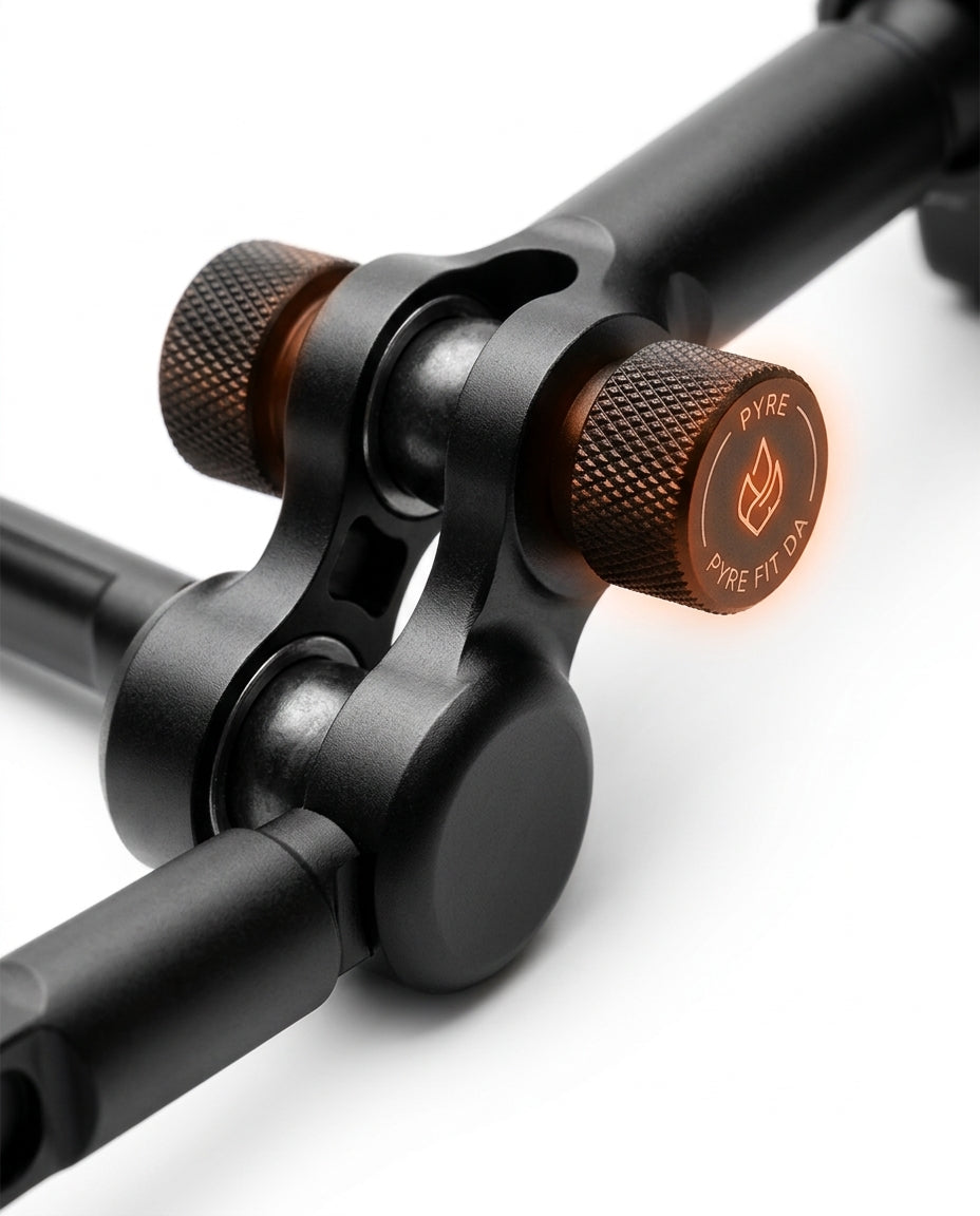 Macro of the mount's dual arm joints with knurled tightening knobs