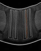 Macro of the rigid vertical lumbar stays at the back of the support belt