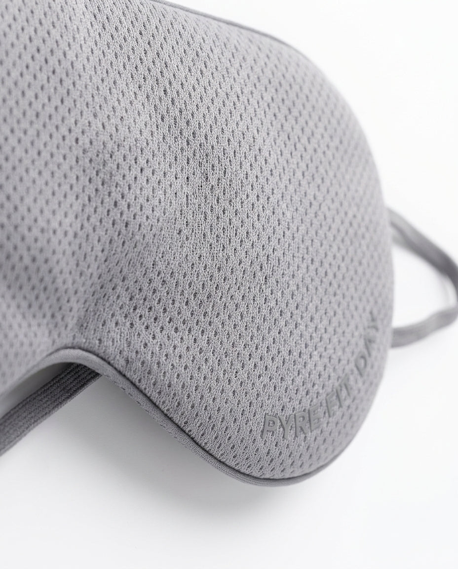 Macro of the grey breathable mesh side of the dual-use silk eye mask