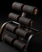 Close-up of the stacked padded foam ankle rollers with orange trim