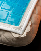 Close-up of the piped seam joining the gel pad to the quilted cover