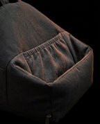 Macro of the elastic front device pocket and angled face of the tablet pillow