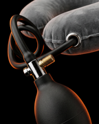 Macro of the black hand-bulb air pump and release valve