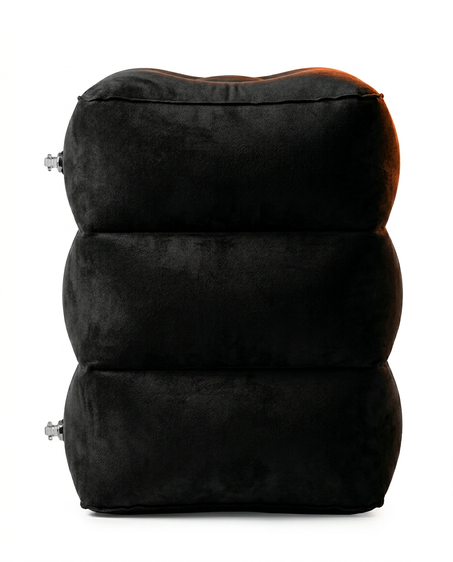 Side view of the triple-chamber stacked design of the black inflatable footrest