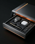 Open storage drawer of the monitor stand holding a watch, glasses and pen