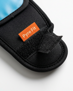 Macro of the gel wrap's adjustable hook-and-loop strap closure