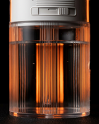Close-up of the clear ribbed detachable water tank filled with water