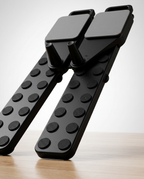 Macro of the black anti-slip rubber feet under the pilates board rails