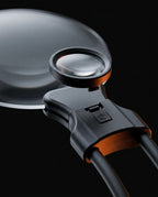 Detail of the detachable lens clip and connector on the neck magnifier