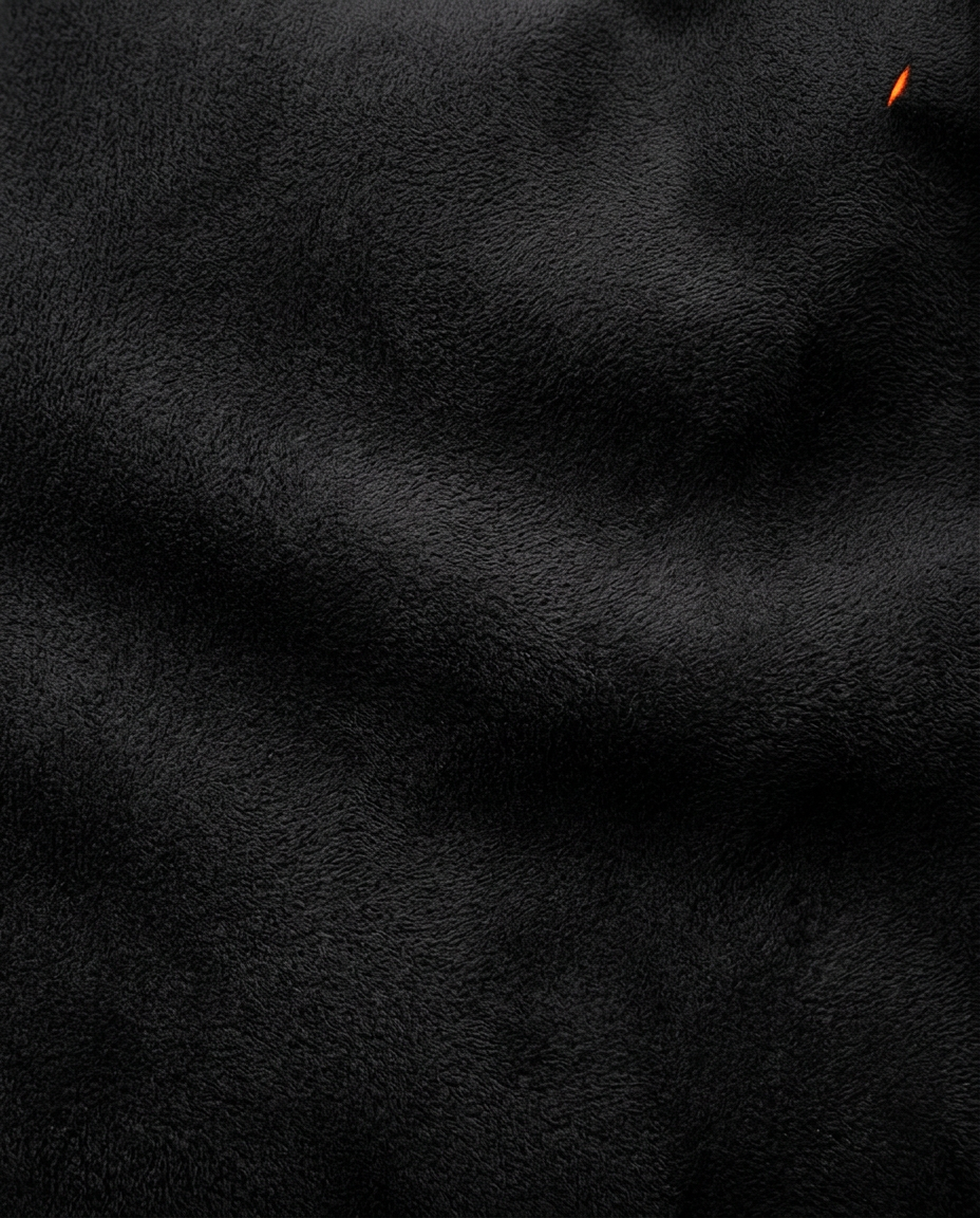 Macro of the soft brushed microfiber fabric covering the travel footrest
