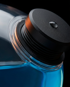 Macro of the black leak-proof fill cap on the water stability ball