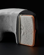 Cutaway view exposing the grey memory foam core of the face-down pillow