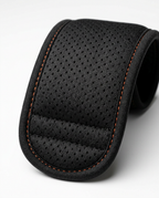 Macro of the wrap's perforated breathable neoprene with orange stitching