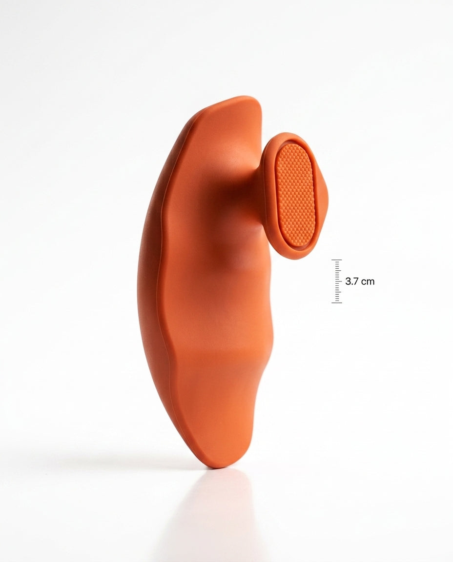 Side profile of orange grip pad showing 3.7 cm ergonomic palm curve