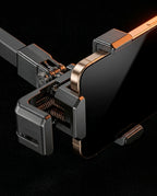 Close-up of the spring-loaded phone cradle gripping a smartphone edge