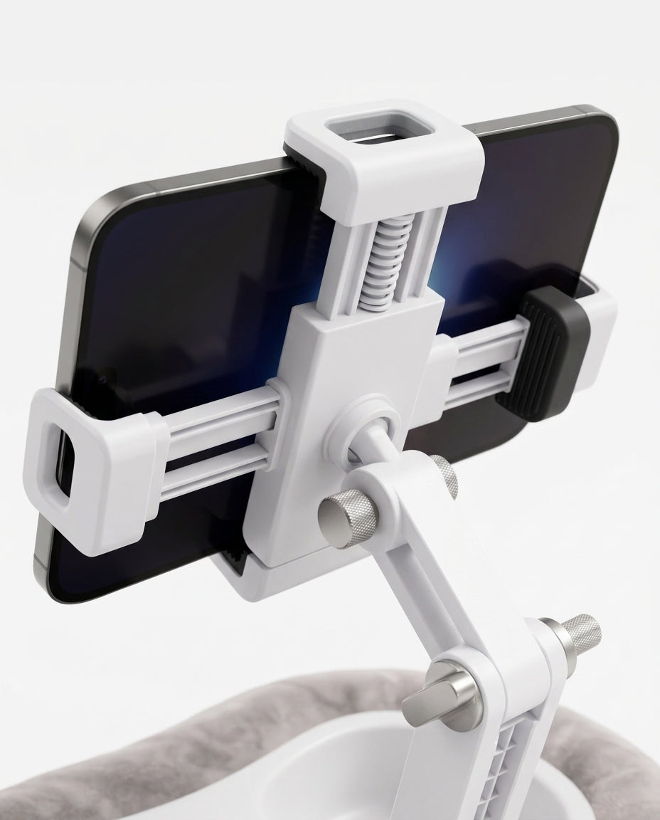 Close-up of the white spring-loaded phone grip clamp holding a smartphone