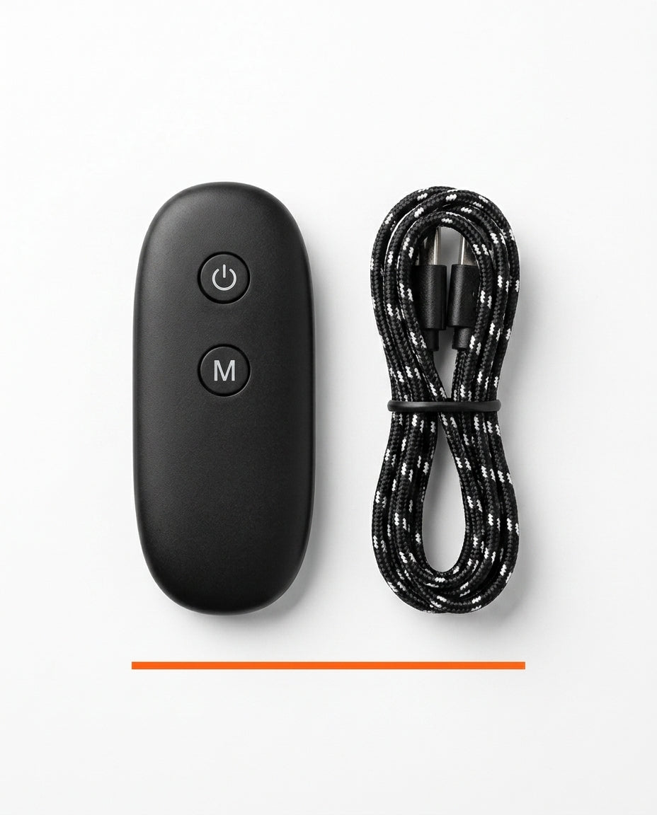 Black wireless remote beside a braided USB-C charging cable on white