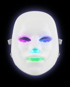Front view of the LED face mask glowing in multiple spectrum colors
