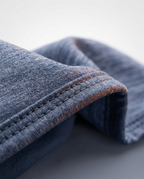 Macro of the cooling blanket's neatly stitched hemmed edge and folded corner